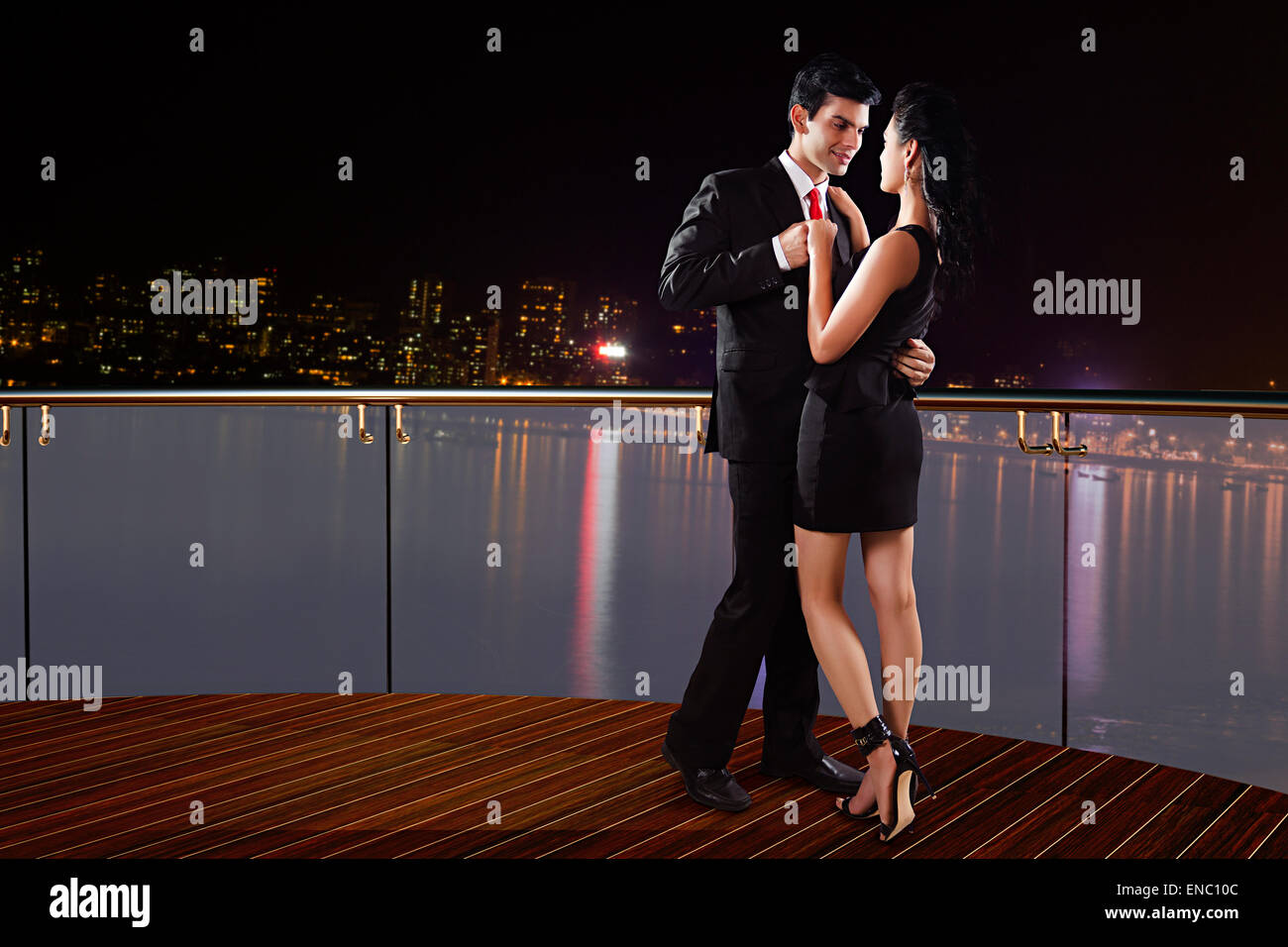 2 indian business Couple beach Ship romance Stock Photo