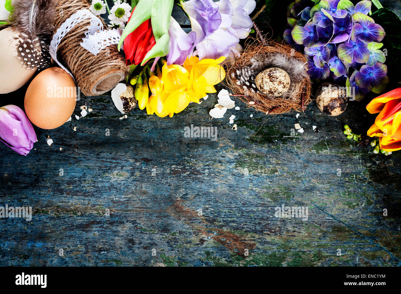 Easter background with eggs, nest and flowers Stock Photo - Alamy