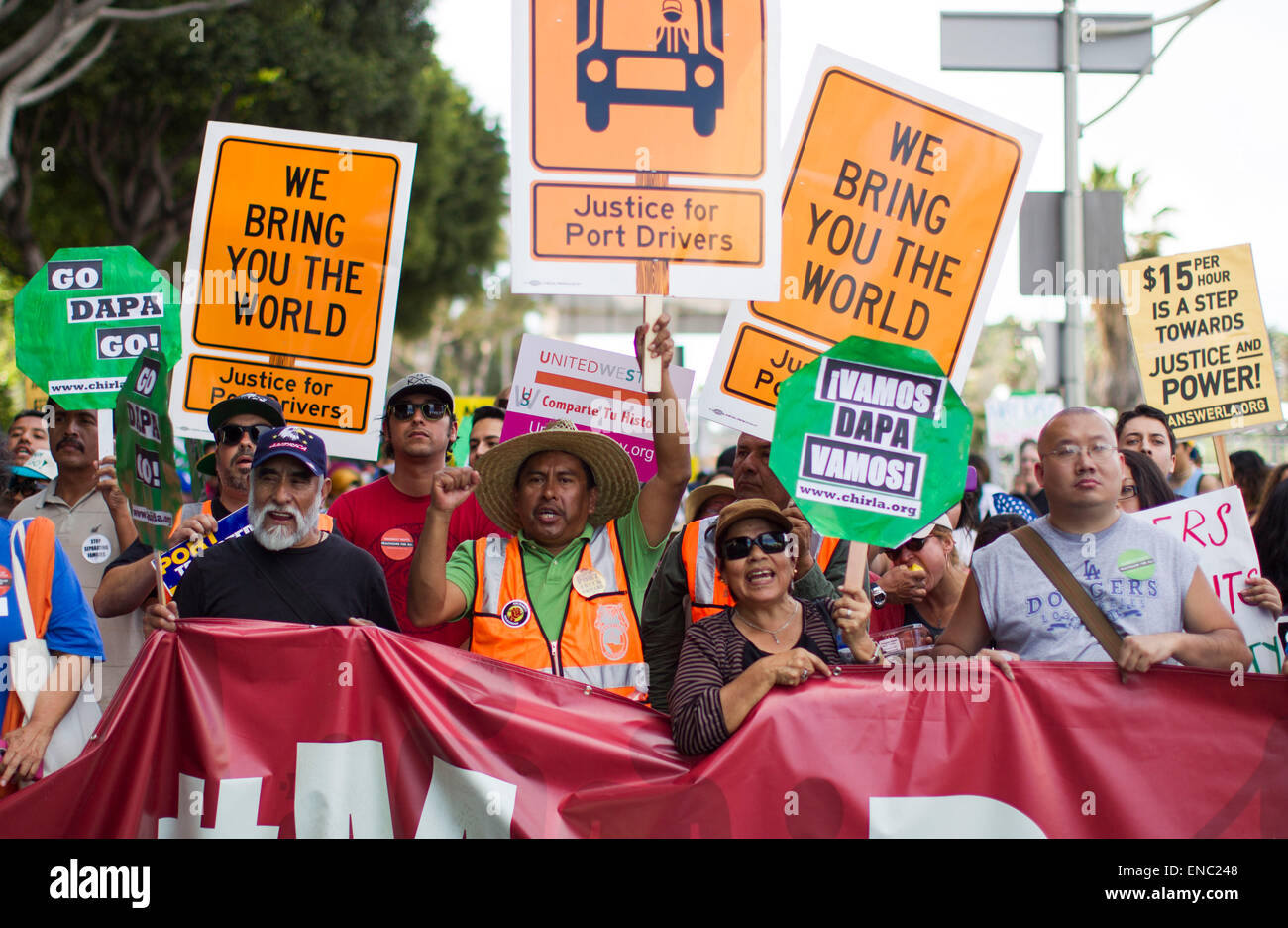 (150502)-- LOS ANGELES, May 2, 2015(Xinhua)-- Protesters march toward downtown Los Angeles as thousands of people participating in the annual May Day march downtown Los Angeles May 1, 2015. Labor organizations and immigration groups held the annual celebration to push for higher wages, immigration reform and justice for minorities. (Xinhua/Zhao Hanrong)(azp) Stock Photo