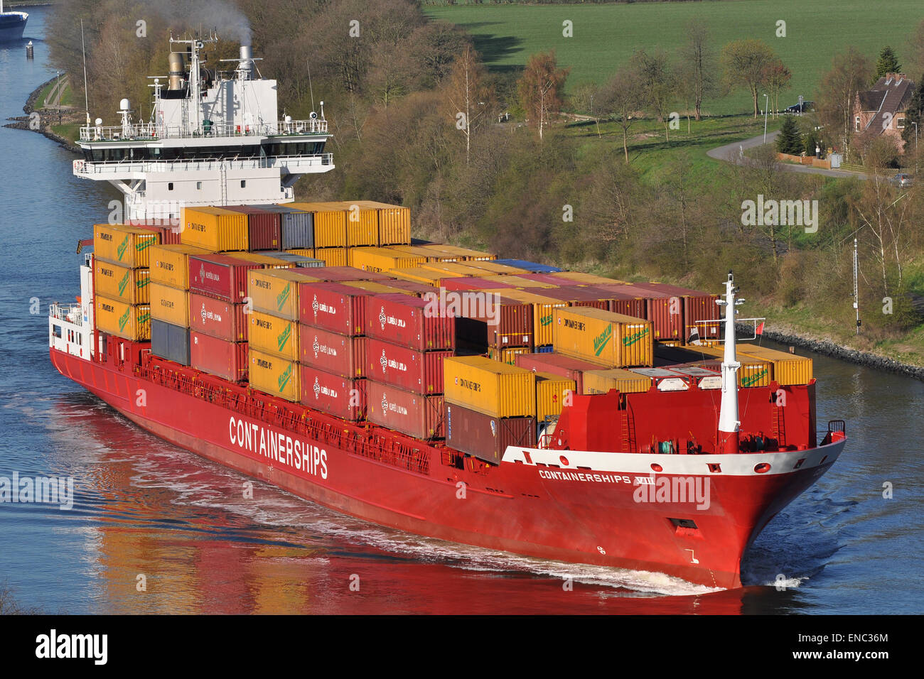 Containerships VIII passing the Kiel Canal eastbound. Stock Photo