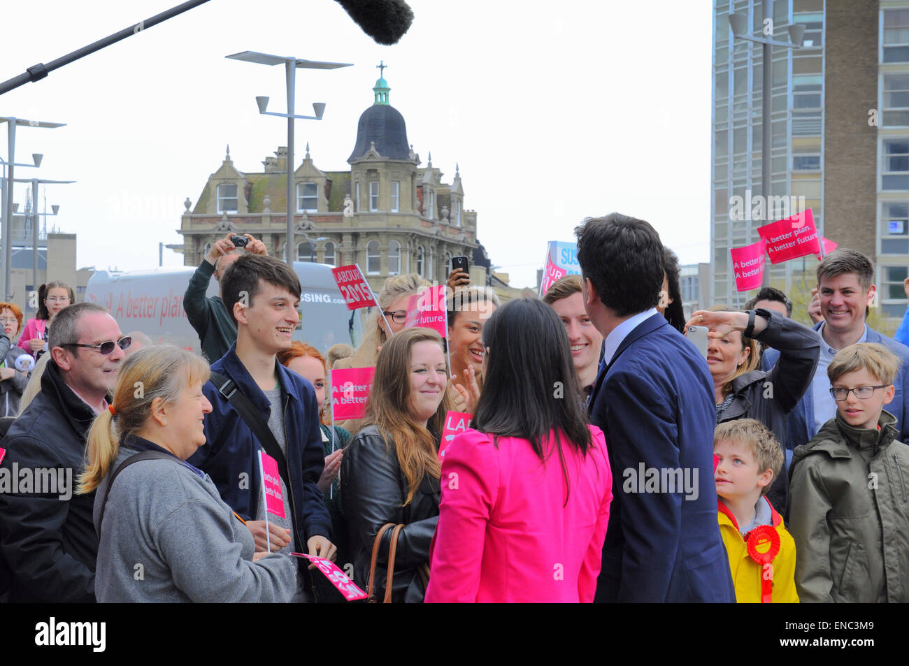 Hastings, East Sussex, UK. 2nd May, 2015. Ed Miliband and Sarah Owen the Labour candidate for Hastings and Rye Constituency greet happy supporters. The key marginal seat is currently held by Conservative Amber Rudd.  Credit:  David Burr/Alamy Live News Stock Photo