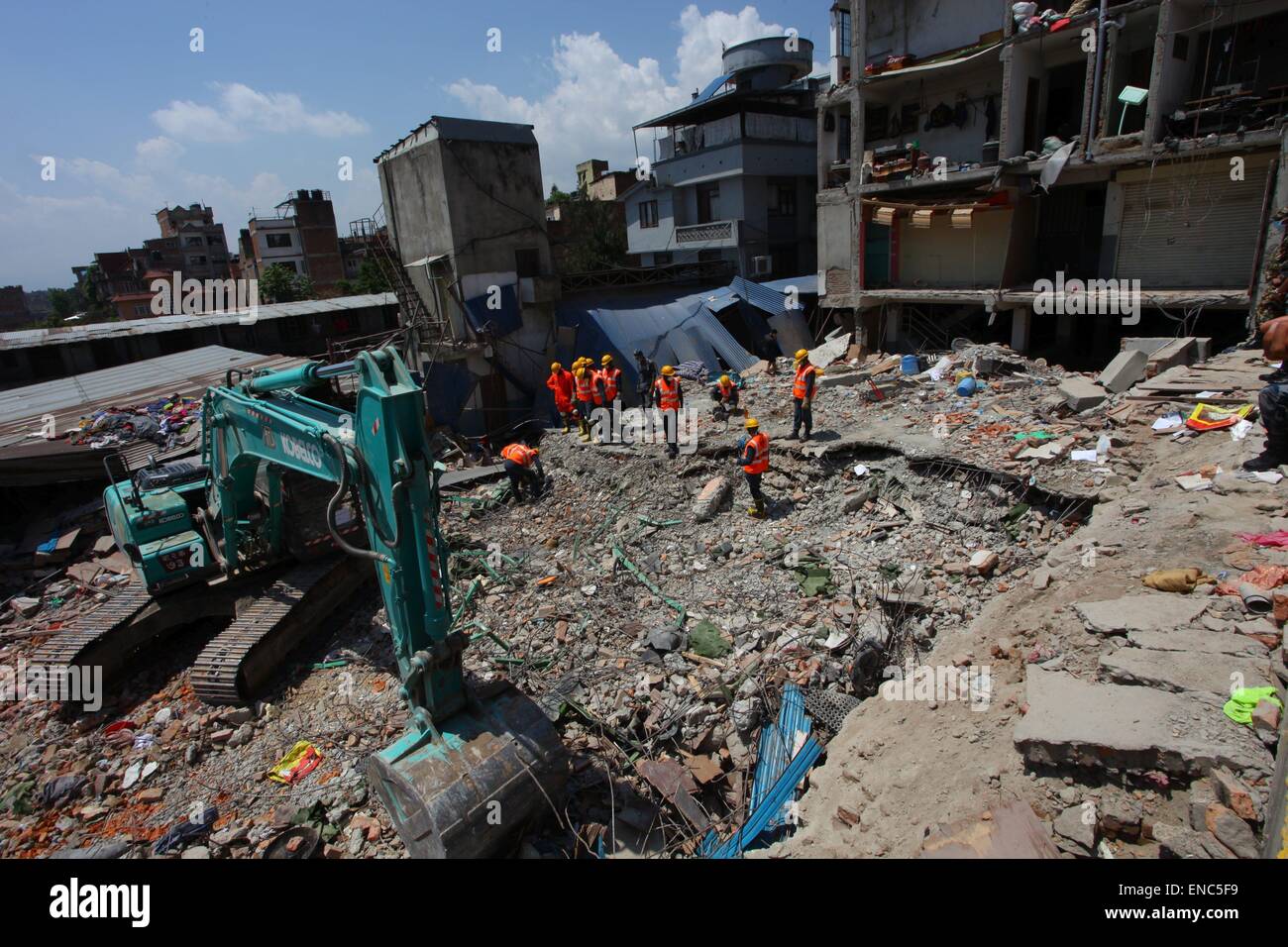 Kathmandu, Nepal. 2nd May, 2015. Rescuers work on debris after the massive earthquake on April 25 in Kathmandu, Nepal, May 2, 2015. The death toll of the earthquake climbed to 6,659 and 14,062 people were injured, the Home Ministry said on Saturday. Credit: Sunil Sharma/Xinhua/Alamy Live News Stock Photo