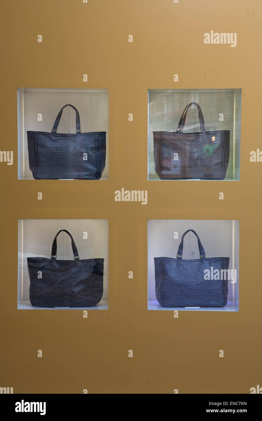 Handbags display in shop window. Stock Photo
