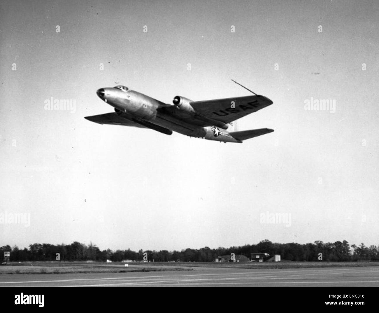 A photograph of the Martin B-57 Canberra, a U.S. military bomber aircraft used during the Cold War, showcasing its role in military operations and design. Stock Photo