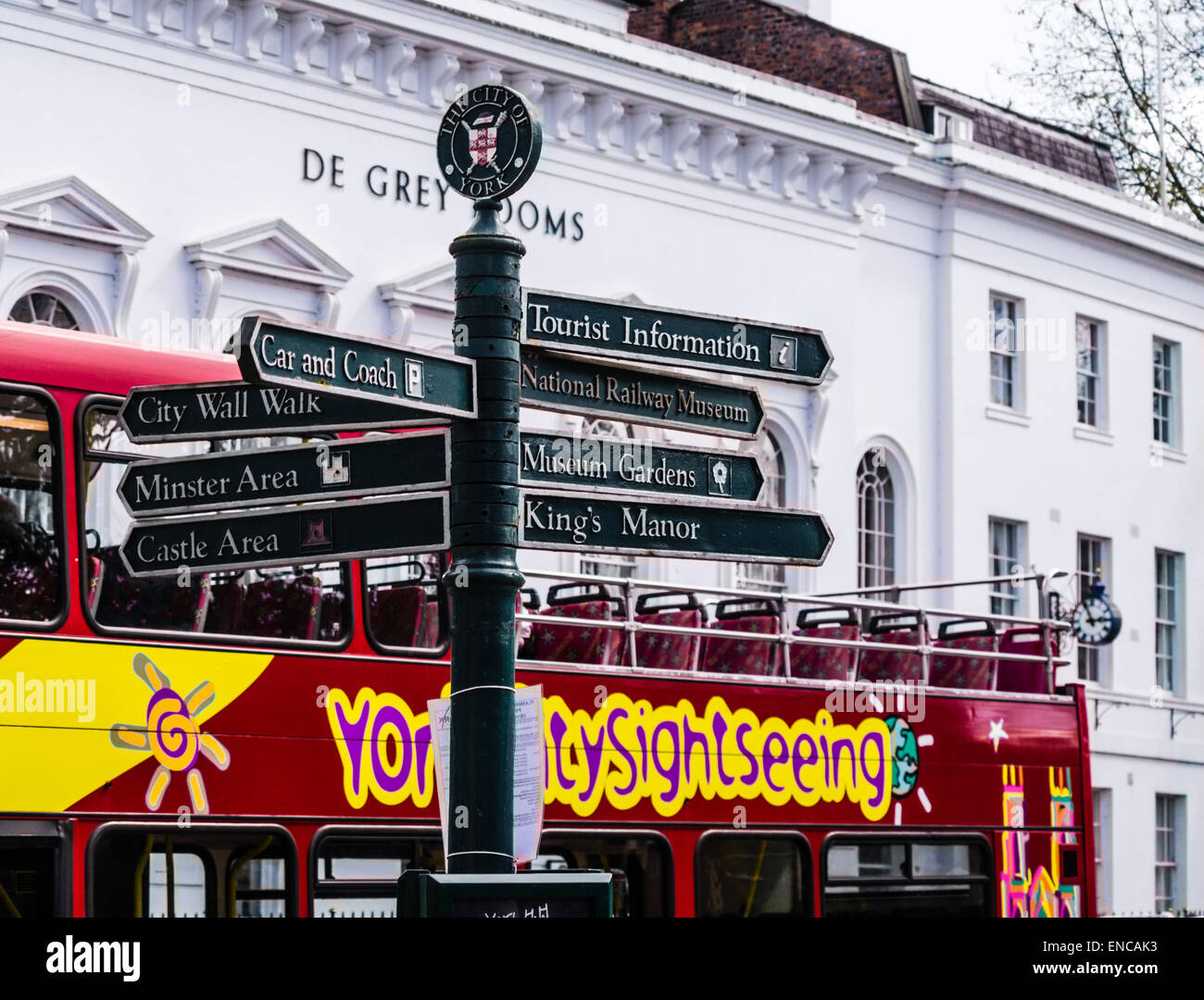 Tourist attractions signpost opposite the De Grey Rooms, St Leonard's Place, York, England, UK Stock Photo