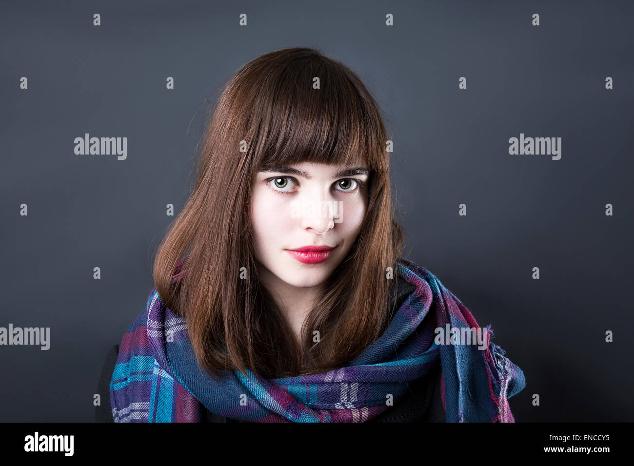 portrait of a woman in studio with black background Stock Photo - Alamy