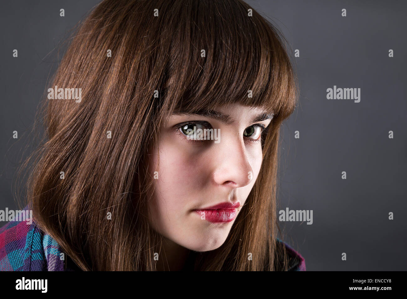 portrait of a woman in studio with black background Stock Photo - Alamy