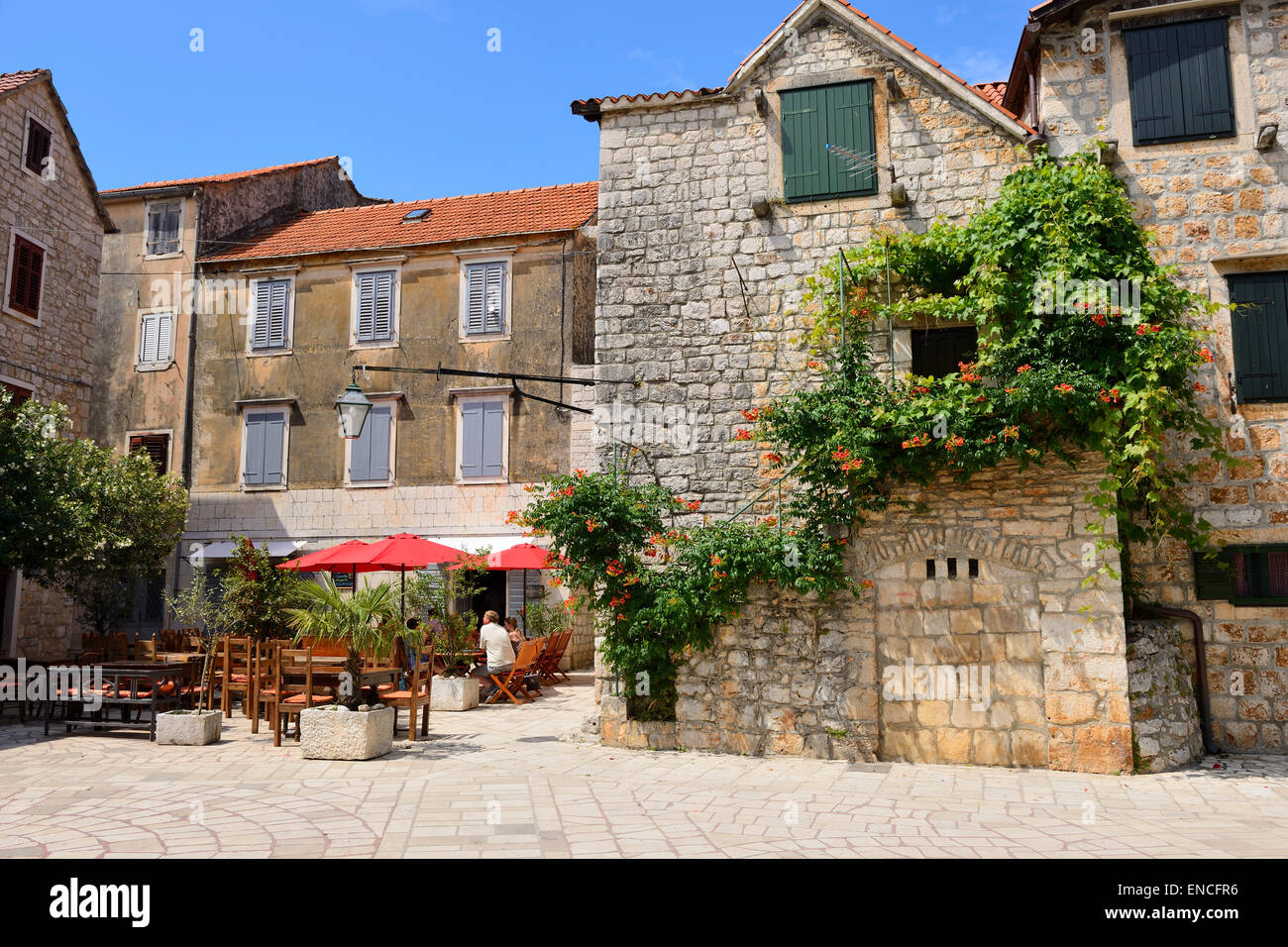 Outdoor restaurant in Stari Grad on Hvar Island on Dalmatian Coast of Croatia Stock Photo