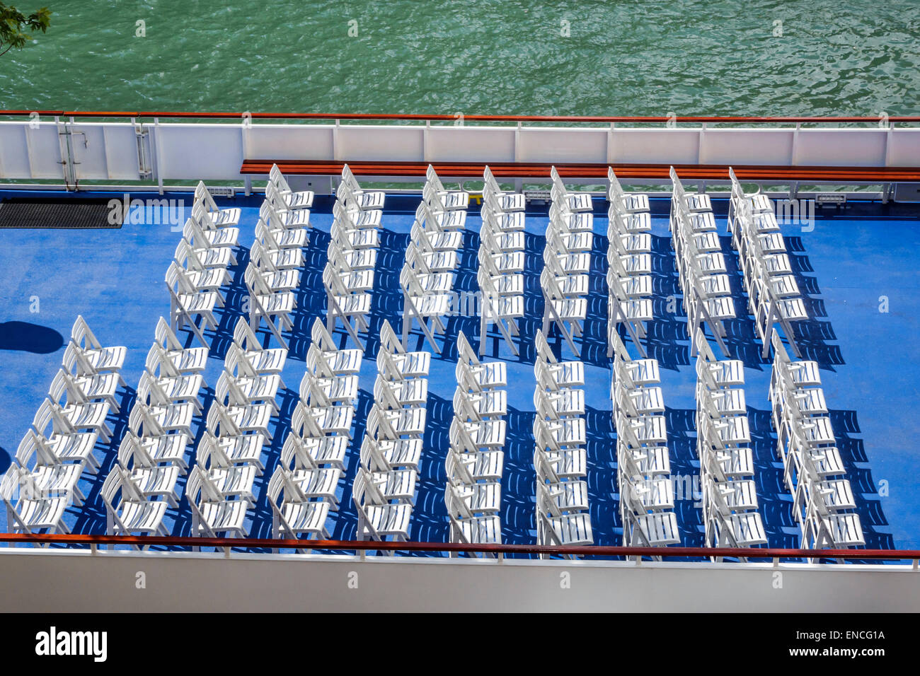 Chicago Illinois,Chicago River,boat,tour boat,upper deck,chairs,rows,organized,align,water,blue,white,empty,IL140908023 Stock Photo