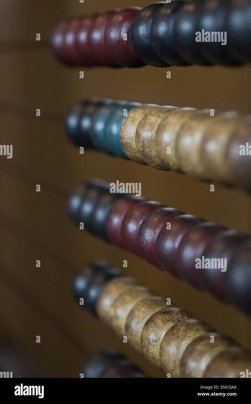 Old wooden Victorian abacus. Shallow depth of field, victorian abacus with original painted colours. Detail shot. Stock Photo