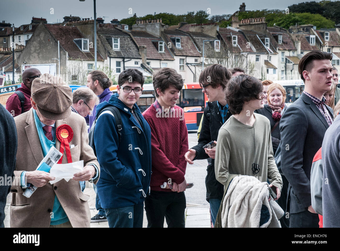 Hastings, East Sussex, UK.2 May 2015.The last few days of campaigning as Ed Miliband visits key marginal constituency Hastings and Rye. In this picture supporters of all ages await his arrival outside Sussex Coast College Stock Photo