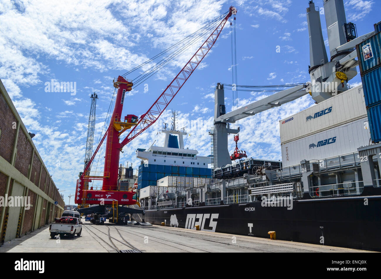 Transnet crane loading containers in the port of Cape Town, South Africa Stock Photo