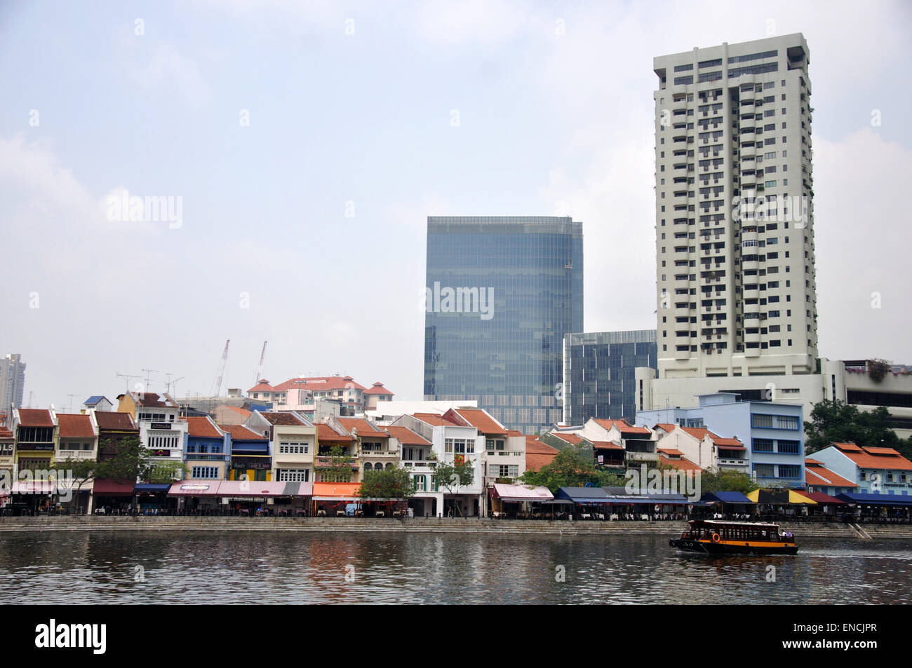 SINGAPORE, FEBRUARY 13: A ferry carries passengers through a retail district on February 13, 2009 in Singapore city Stock Photo