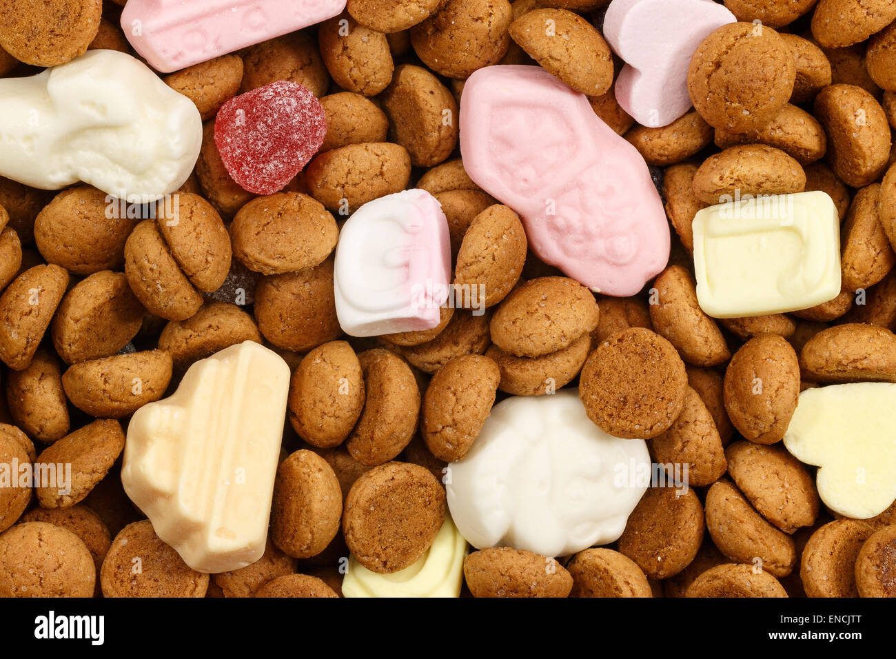 Background pepernoten and colorful sweets Sinterklaas. Typical food for Sinterklaas celebration on 5 december. Event in Holland, Stock Photo