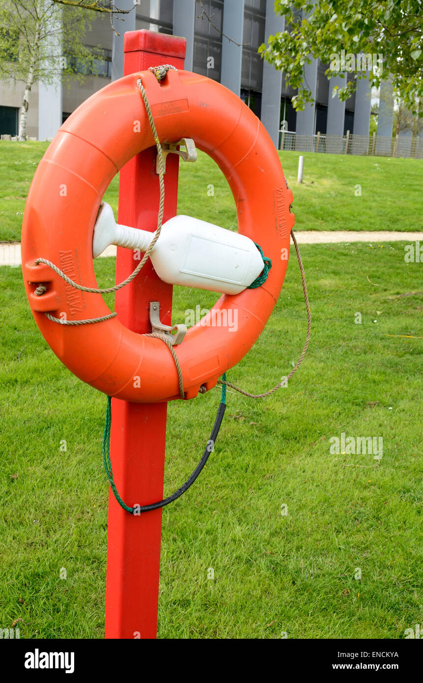 A safety ring at the side of a lake Stock Photo Alamy