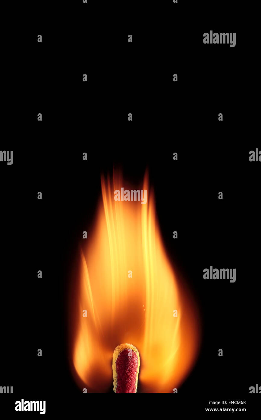 flame of a burning match on black background Stock Photo - Alamy