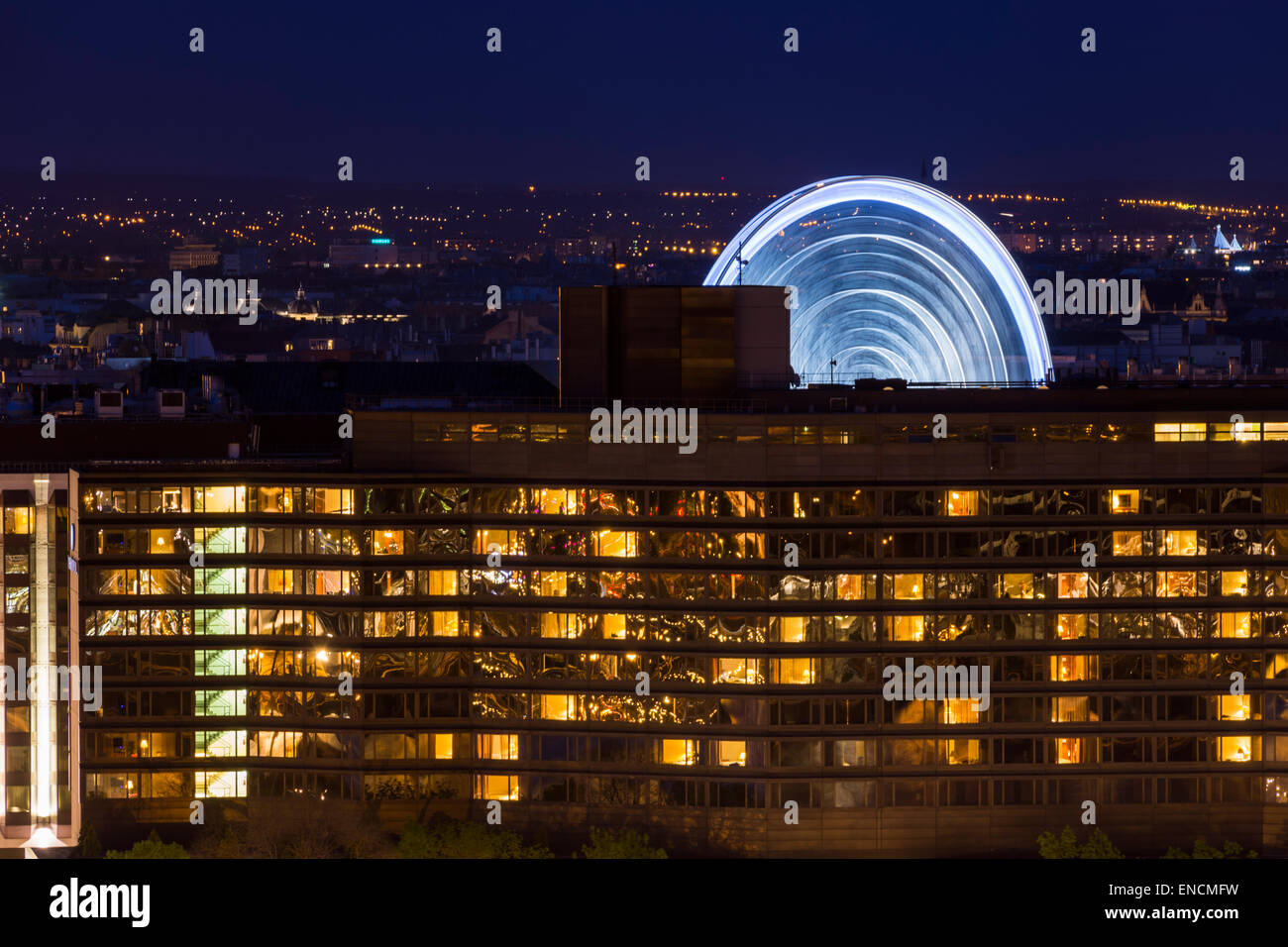 Motion blur of the Sziget Eye in Budapest caused by a long exposure. In front is the Intercontinental Hotel. Stock Photo