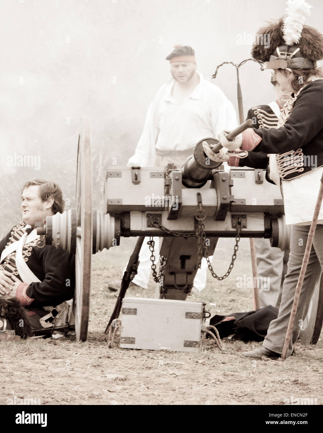 A wounded Royal Horse Artillery gunner lies next to his field gun, in a ...