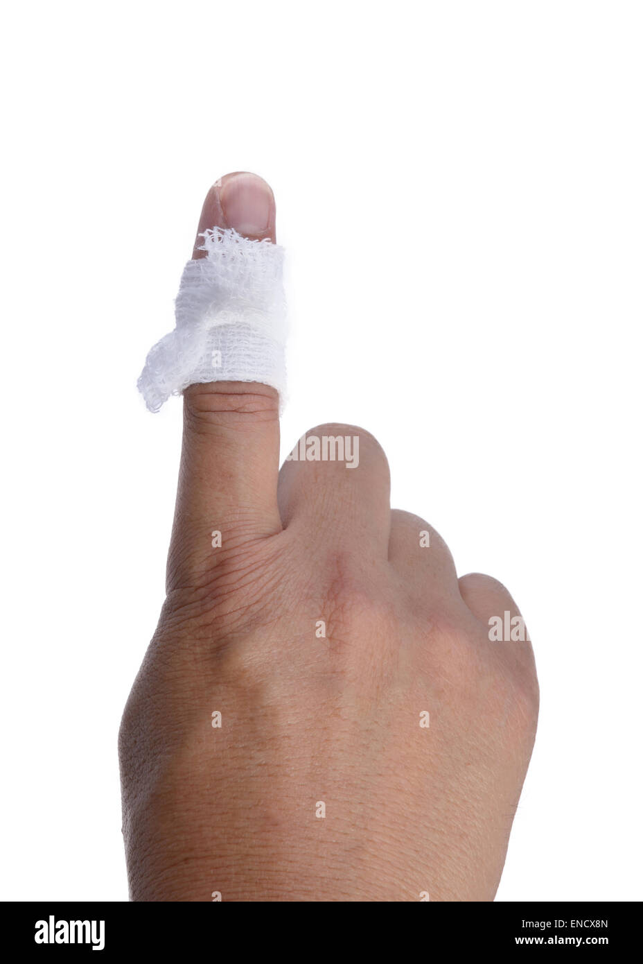 Finger with a bandage wrapped around the injury on a white background. Stock Photo