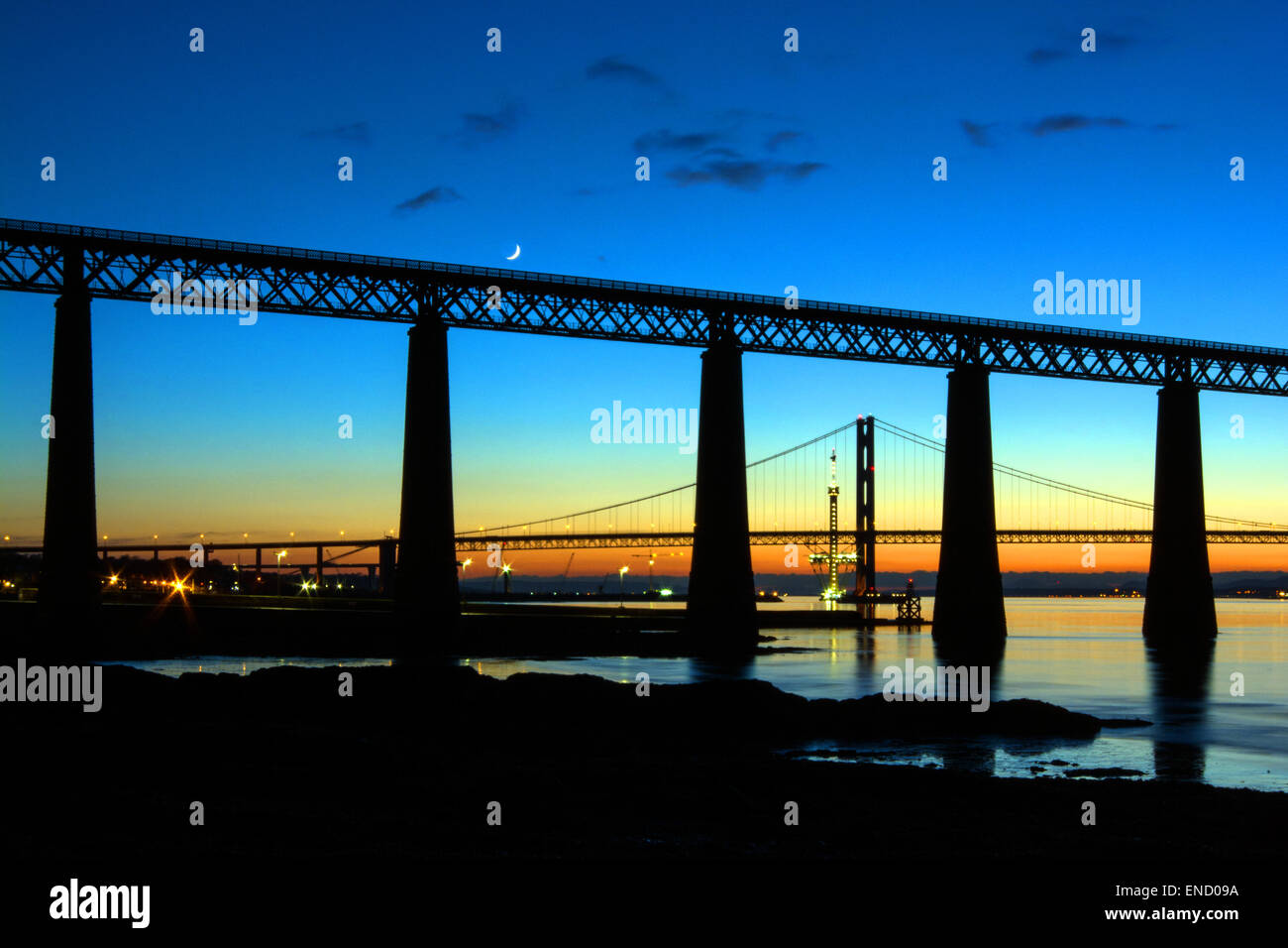 Sunset and moon over the Forth bridges Stock Photo
