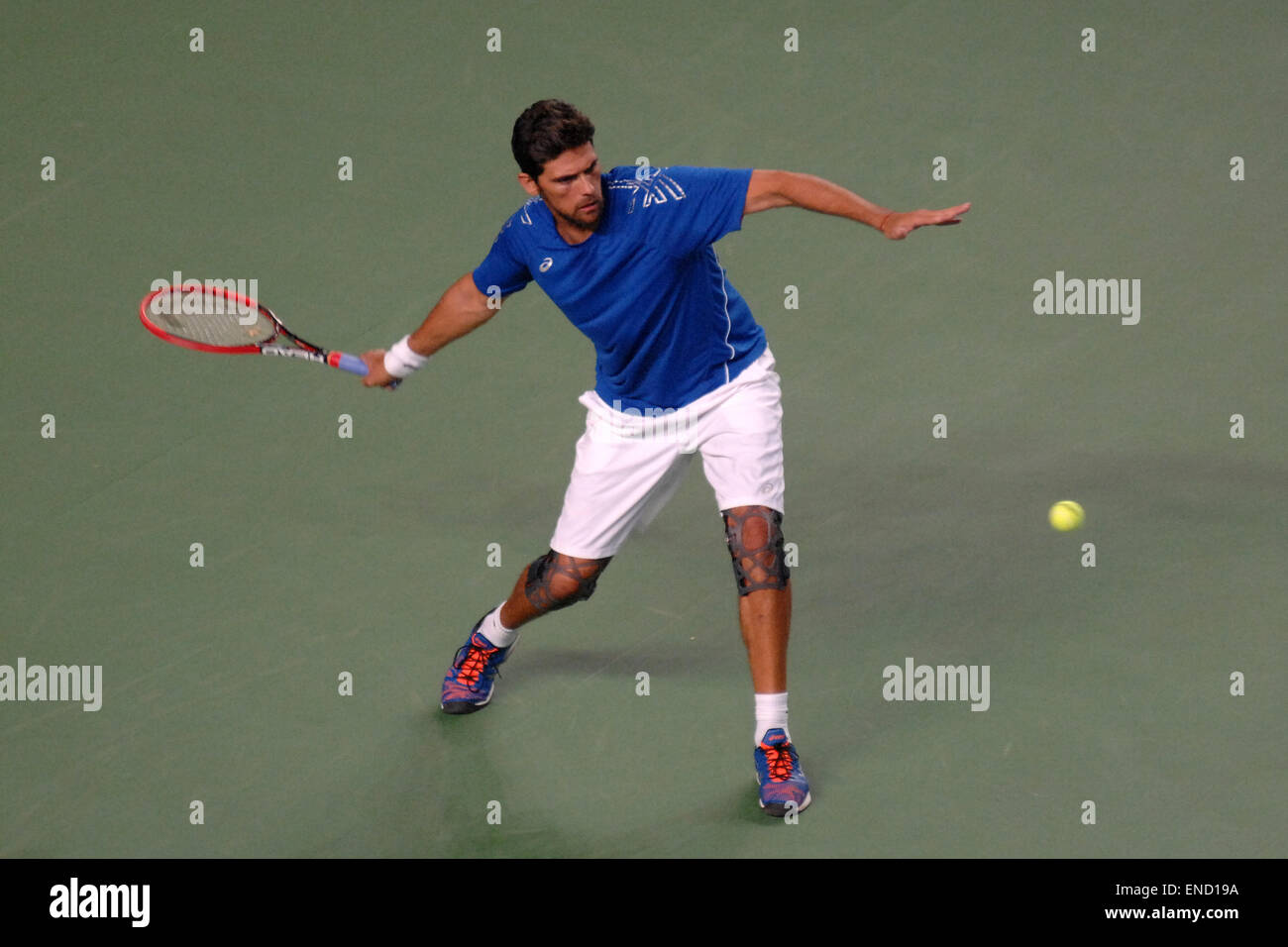 Vancouver, Canada. 2nd May, 2015. Mark Philippoussis of Australia returns a hit against Michael Chang of the United States during the PowerShares Champions showdown tennis tournament in Vancouver, Canada, May 2, 2015. It is the first ever PowerShares Series tennis circuit event held in Canada. Credit:  Sergei Bachlakov/Xinhua/Alamy Live News Stock Photo