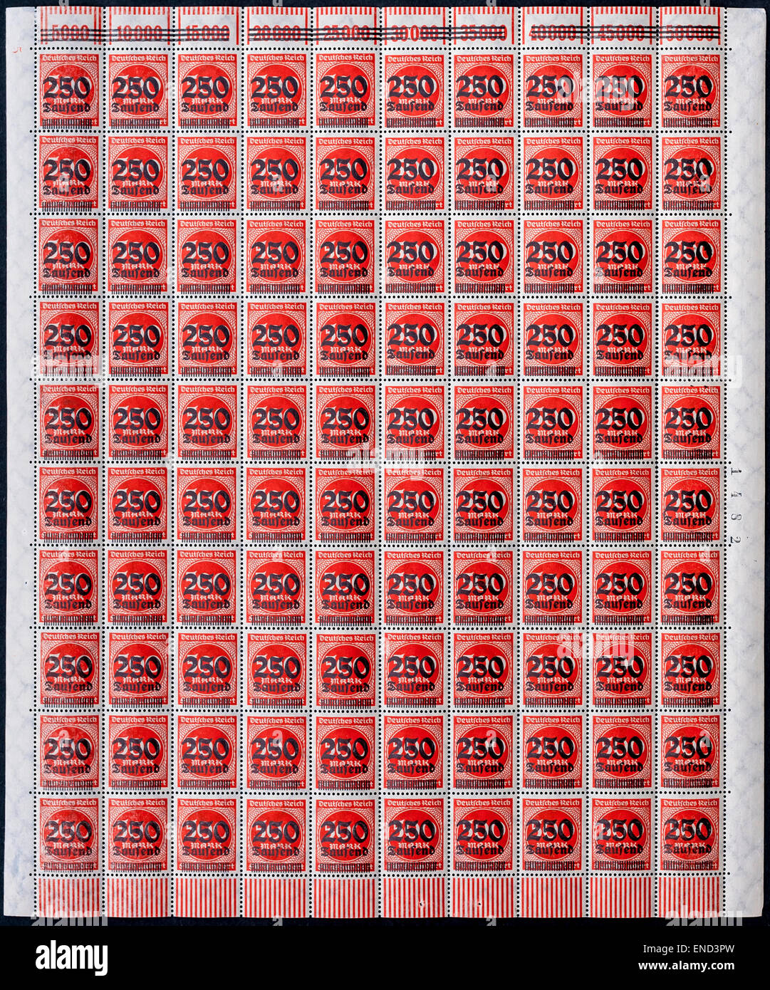 Complete sheet of 100 unused 1923 German 250,000 Mark overprinted “hyper-inflation” stamps - Germany. Stock Photo