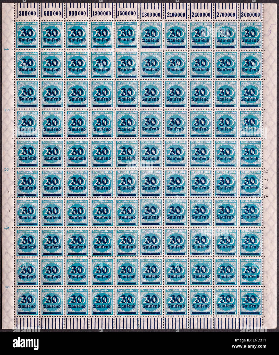 Complete sheet of 100 unused 1923 German 30,000 Mark overprinted “hyper-inflation” stamps - Germany. Stock Photo