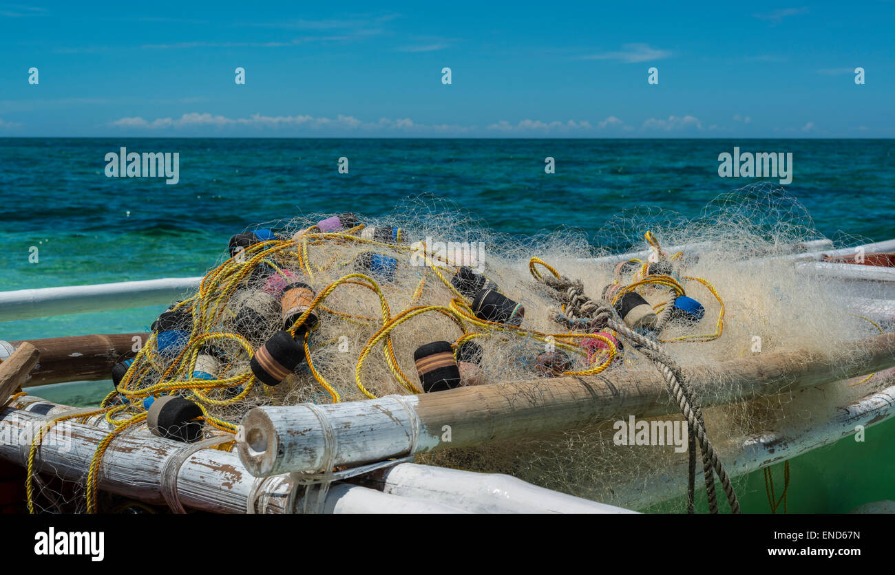 Fishing boat on the beach waiting for the next job Stock Photo Alamy