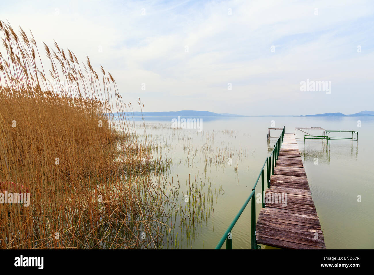 Wooden pier in tranquil lake Balaton-Hungary Stock Photo