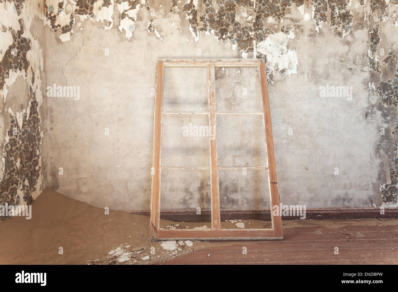 The inside of a deserted house in Kolmanskop, a former diamond town in Namibia. Stock Photo