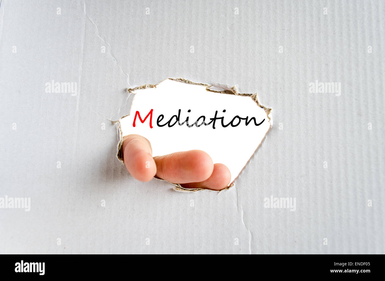 Hand on the cardboard background mediation concept Stock Photo