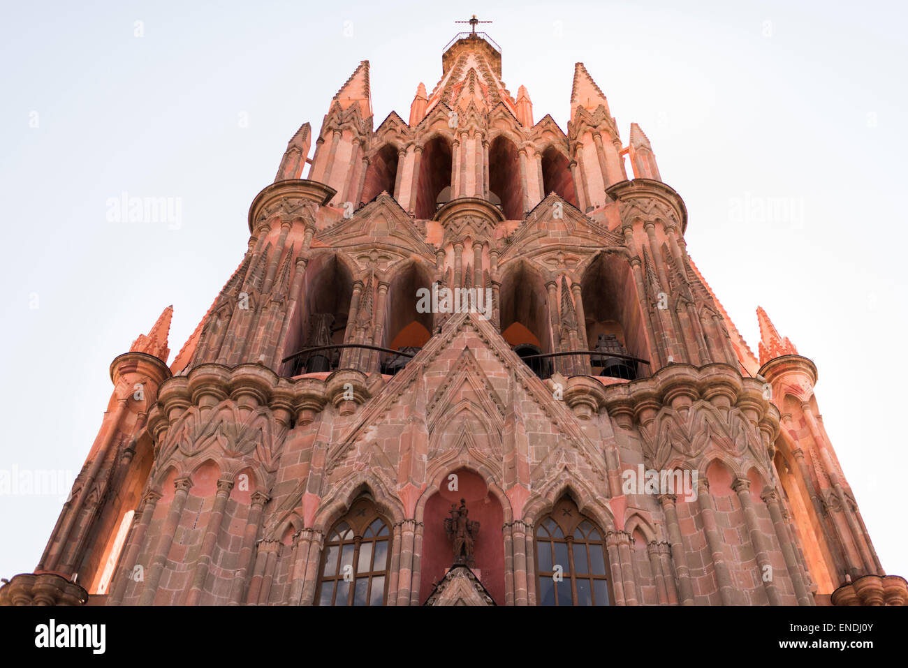 Establishment shot from below of La Parroquia church in San Miguel de Allende Mexico Stock Photo