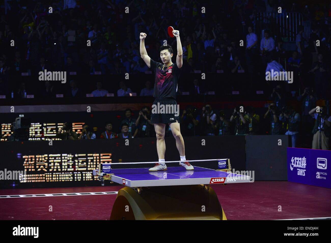 Suzhou, China. 3rd May, 2015. World Table Tennis Suzhou 2015, Men s Singles Final between Chineses FANG BO vs MA LONG at Suzhou International Convention Center. In the photo LONG is celebrating after beats BO 4 - 2. Credit:  Marcio Machado/ZUMA Wire/Alamy Live News Stock Photo
