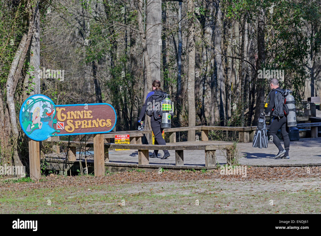 Entrance sign and scuba diver on platform to Ginnie Spring, Ginnie
