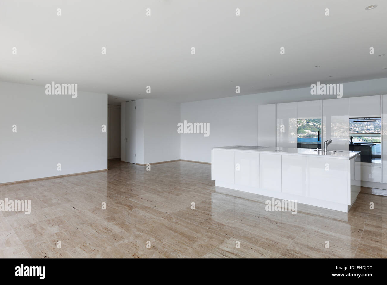 beautiful empty apartment, marble floor, modern kitchen Stock Photo