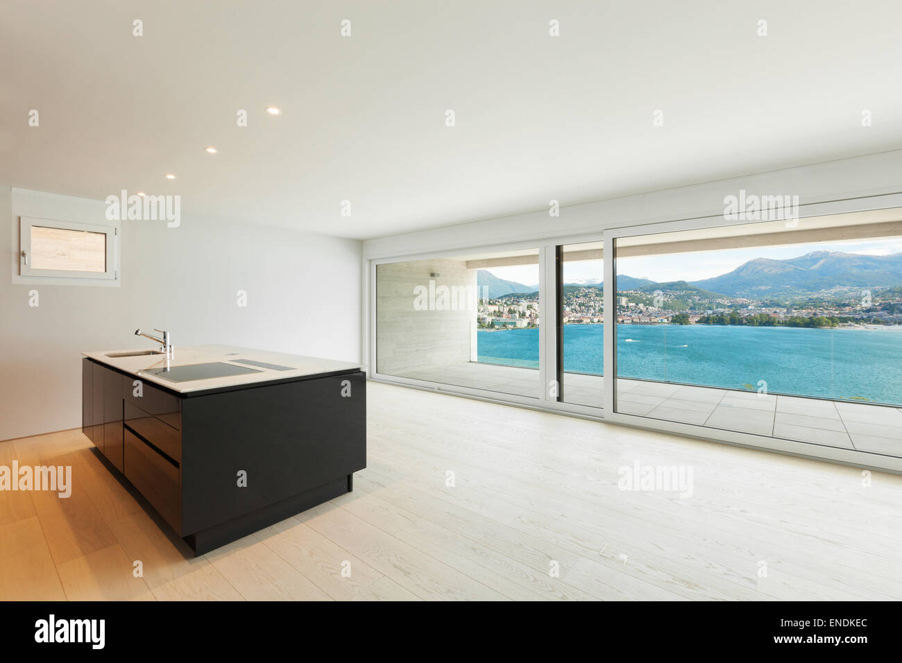 beautiful modern kitchen with window overlooking the lake Stock Photo ...