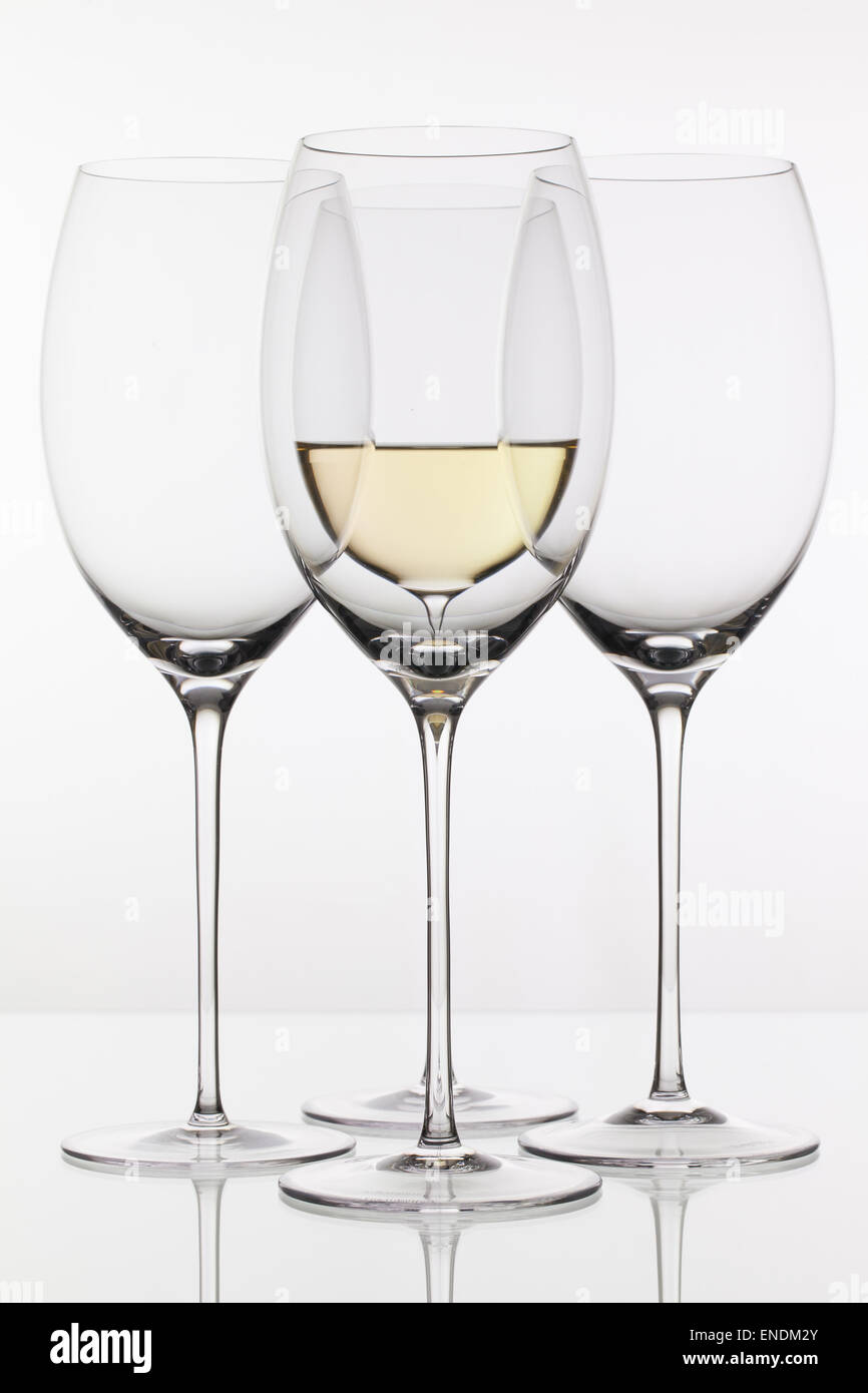 Four glasses of wine on the white background Stock Photo Alamy