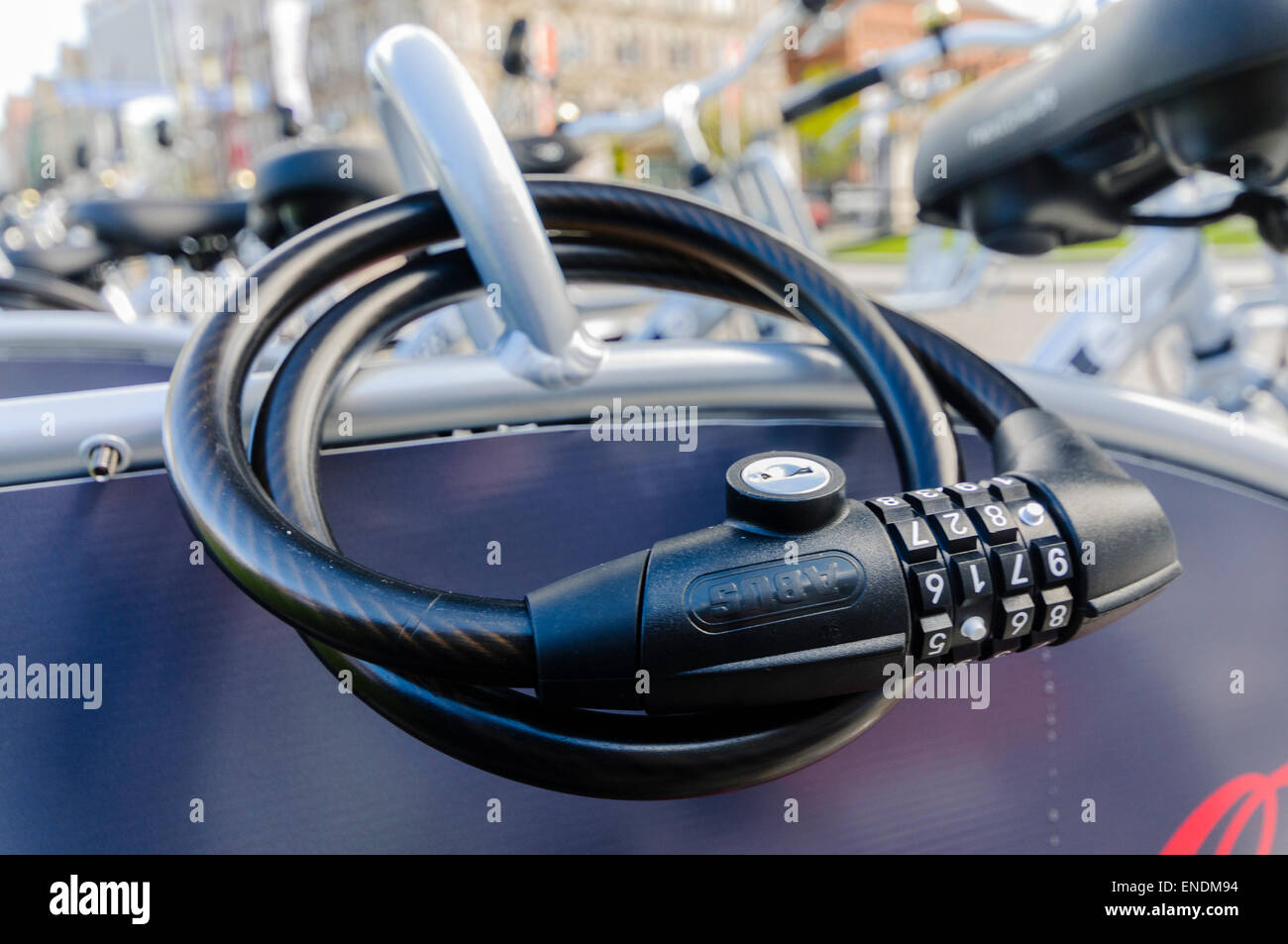 Belfast, Northern Ireland. 26 Apr 2015 A combination bicycle lock on the rear of a bike Stock
