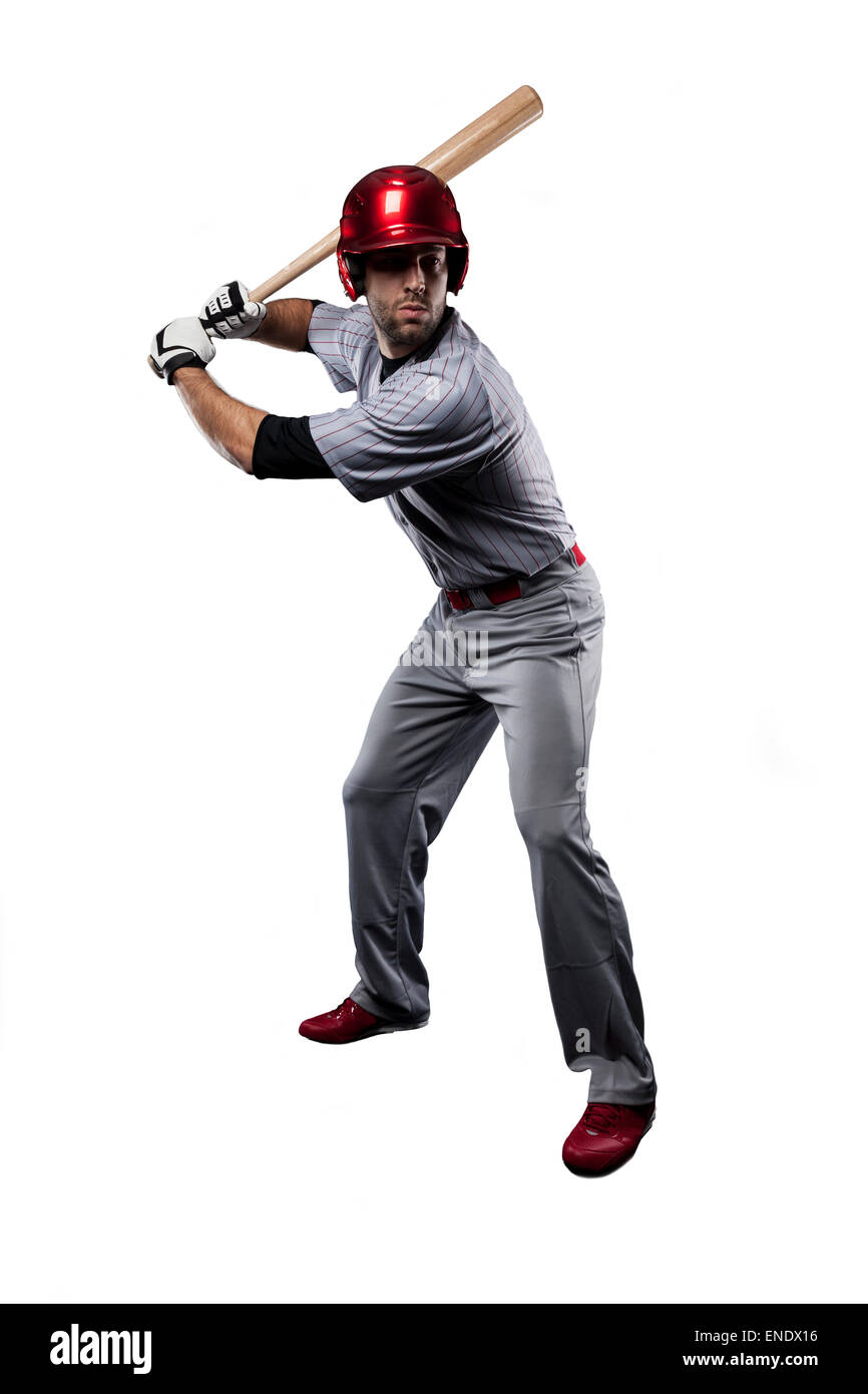 Baseball Player in red uniform, on a white background Stock Photo - Alamy