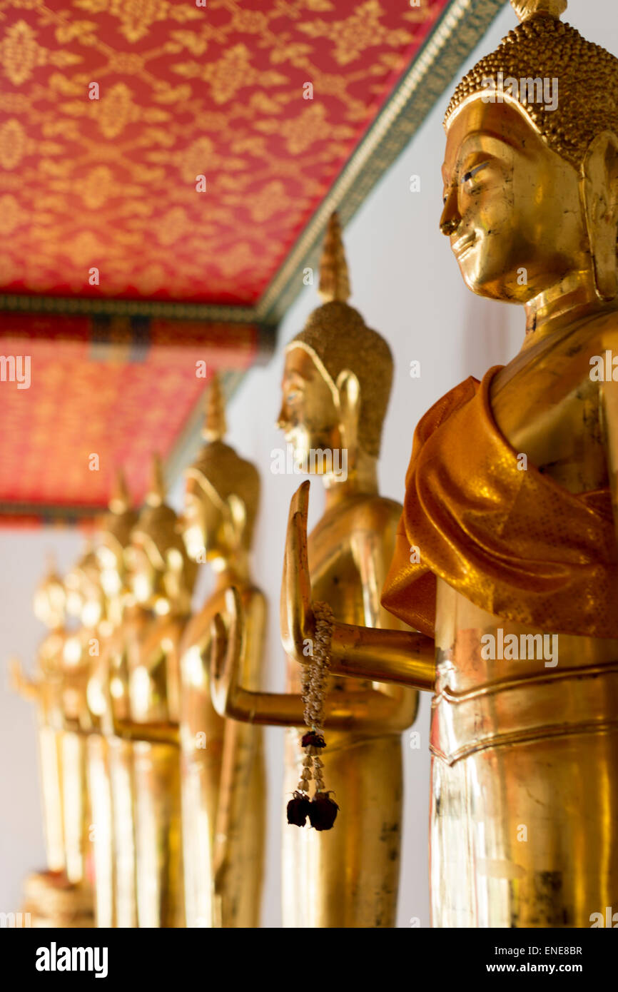 Golden Buddha statues at Wat Pho Buddhist temple, Bangkok, Thailand, Asia Stock Photo