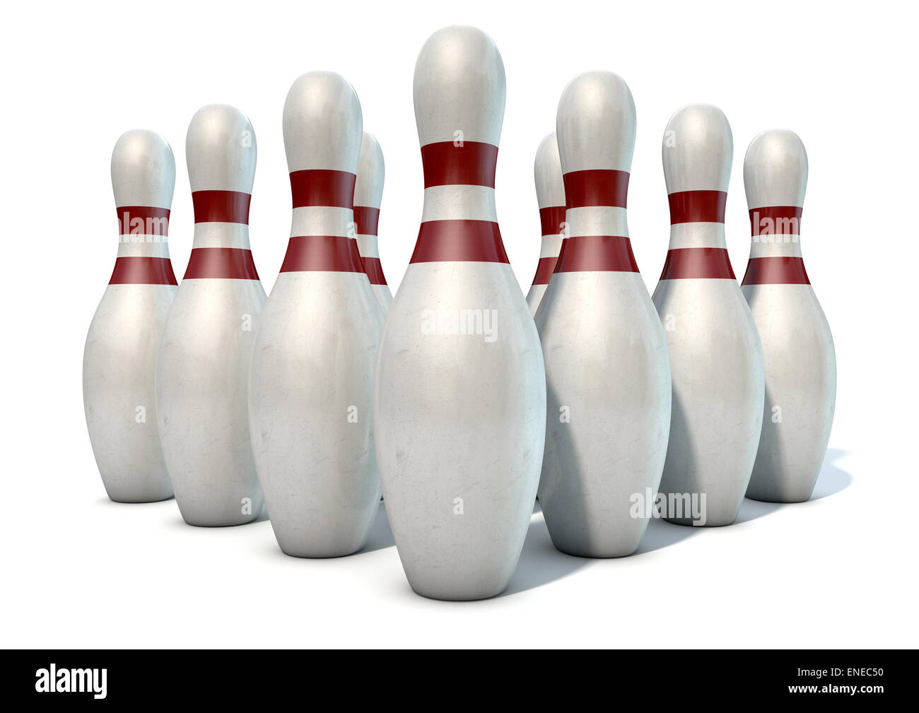 An arrangement of white and red used vintage bowling pins isolated on a
