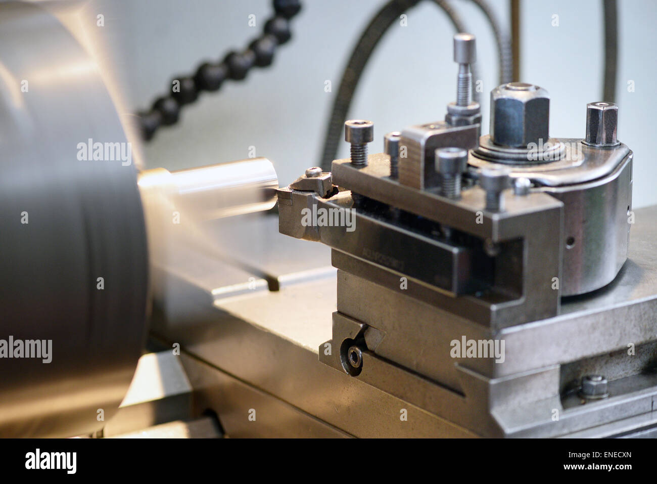 Close Up of Spinning Lathe Machine in Operation, Focus on Individual Components Stock Photo