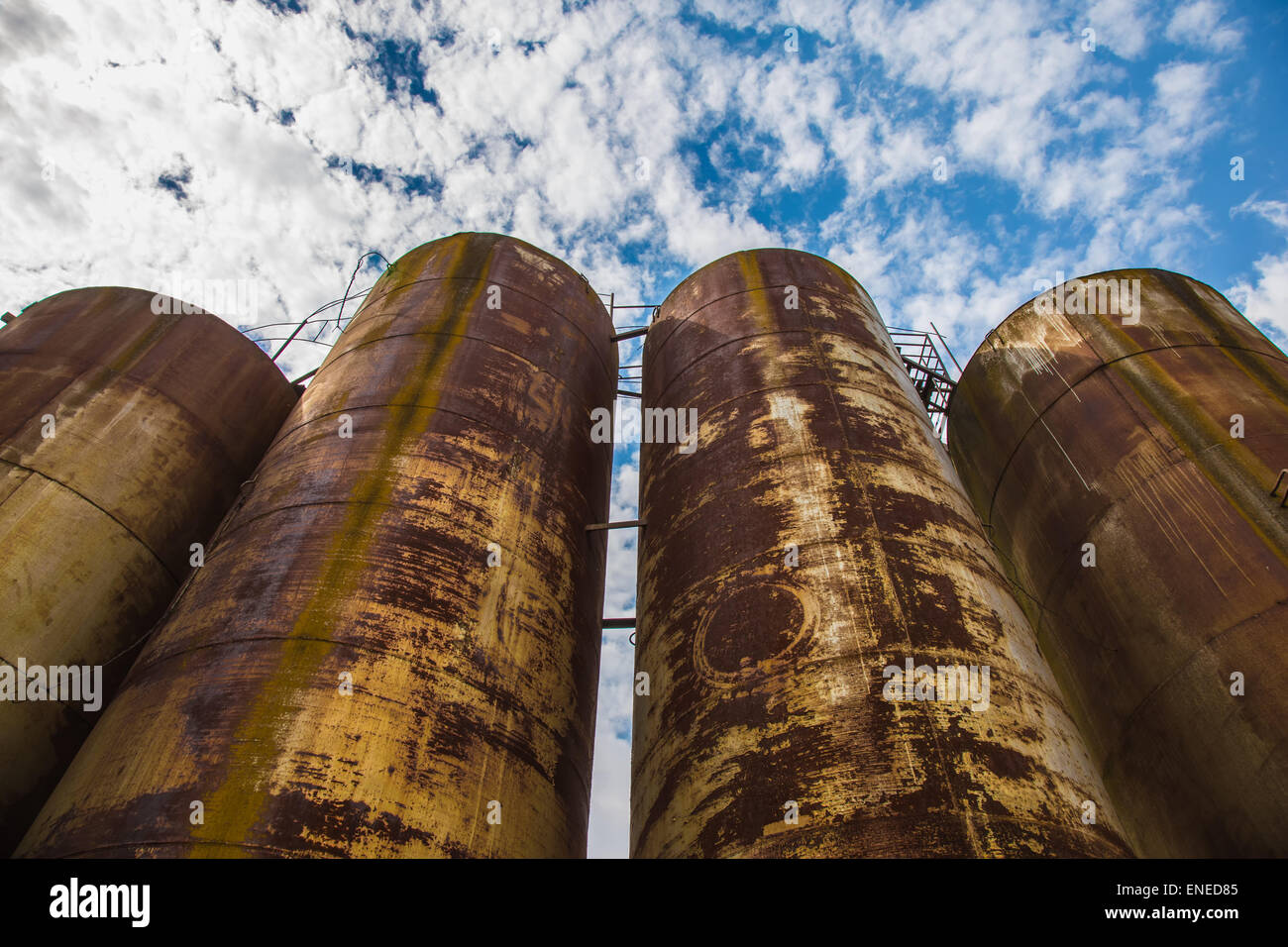 Big old deserted rusty tanks Stock Photo