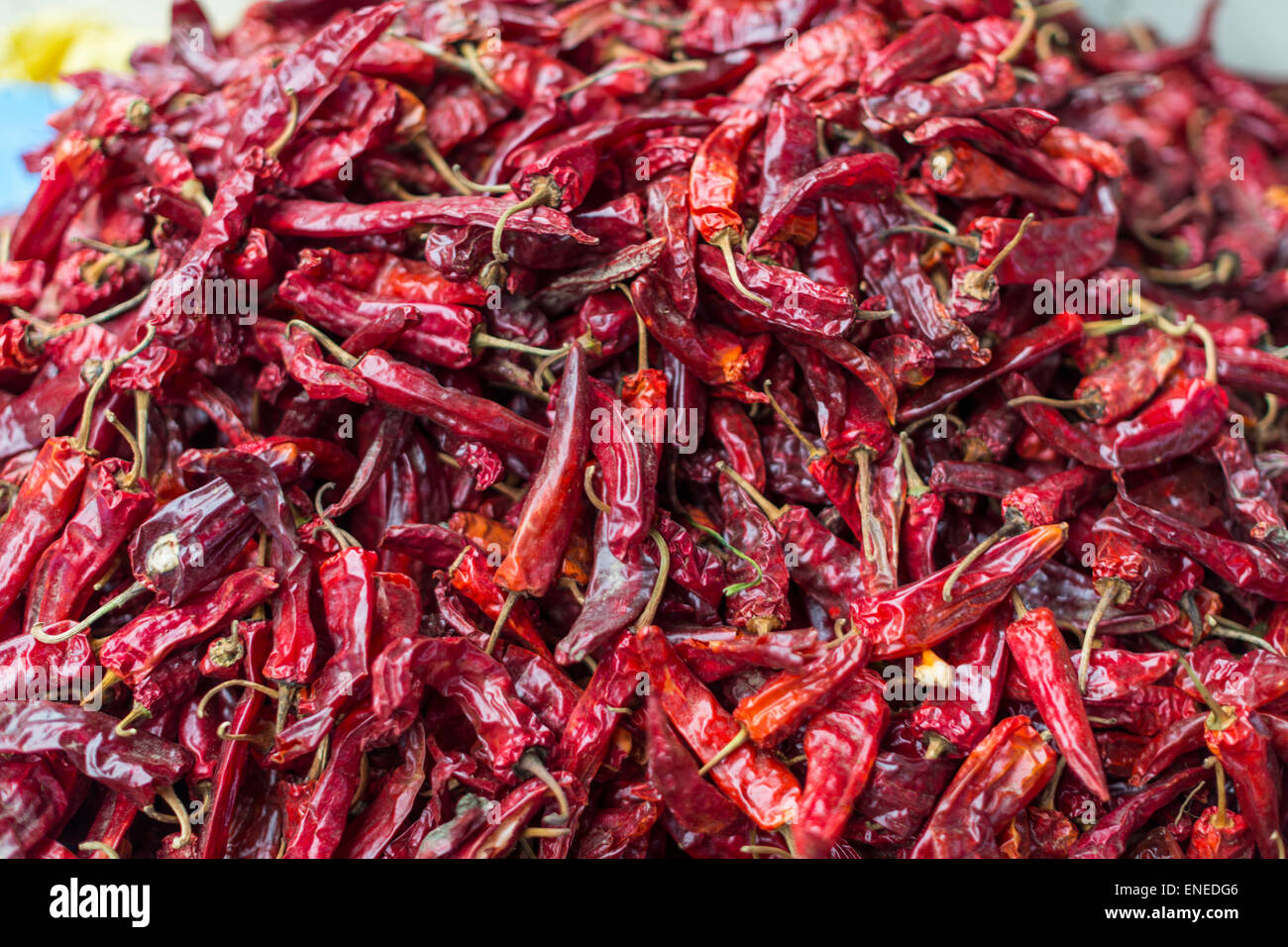 Red chili peppers in market stall in the covered weekend market in Thimphu, Bhutan, Asia Stock Photo