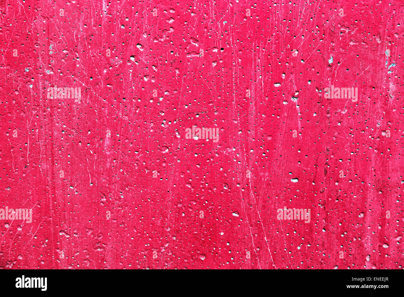 Grunge plaster cement or concrete wall texture pink color with scratches Stock Photo