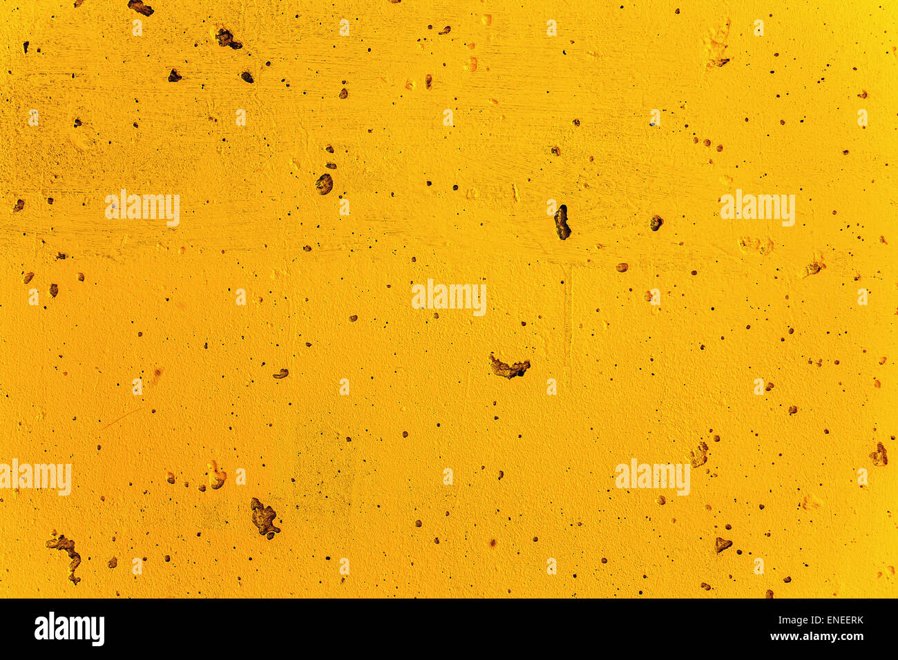 Grunge plaster cement or concrete wall texture yellow color Stock Photo