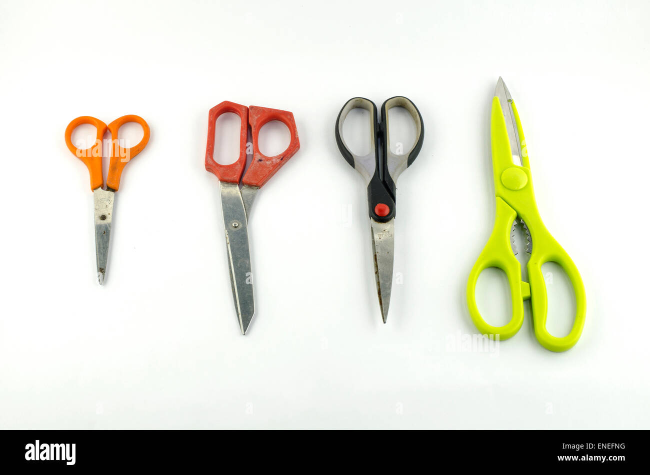 four used Scissors isolated with white background Stock Photo - Alamy