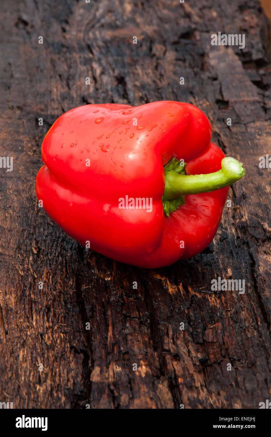 Sweet pepper Red on the old wooden table top Stock Photo - Alamy
