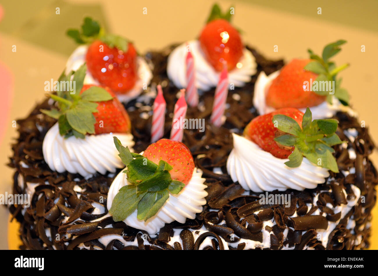 Happy Birthday candles on chocolate cake Stock Photo - Alamy