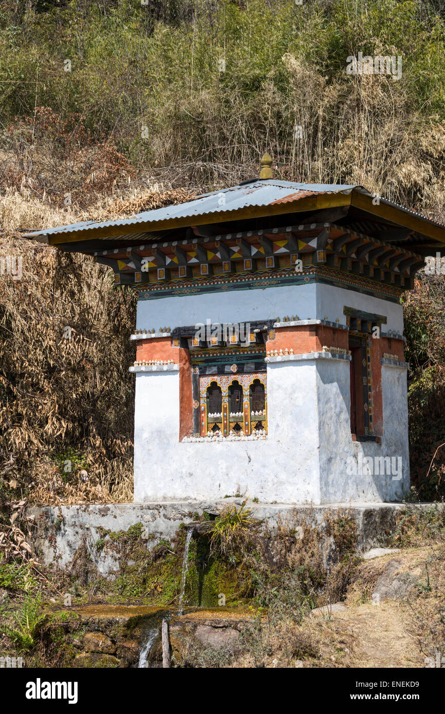Holy water spring (Tshrim drupchhu) near Trongsa, Central Bhutan, Asia Stock Photo